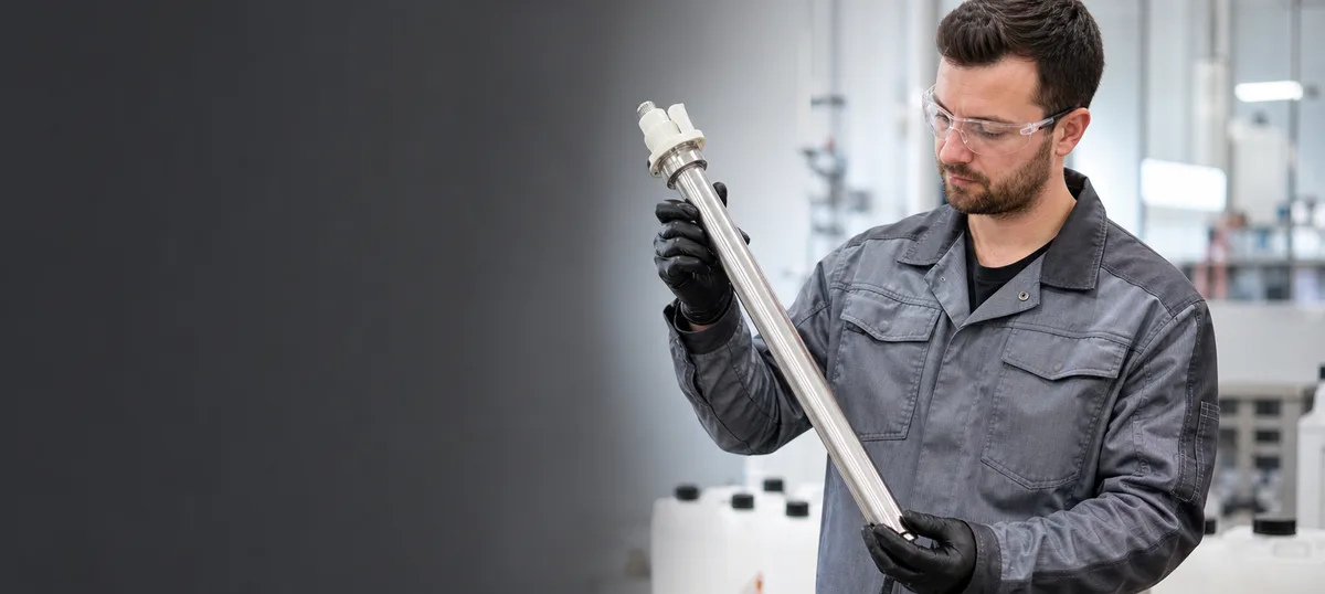 Technician matching a Lutz pump tube to the fluid being transferred